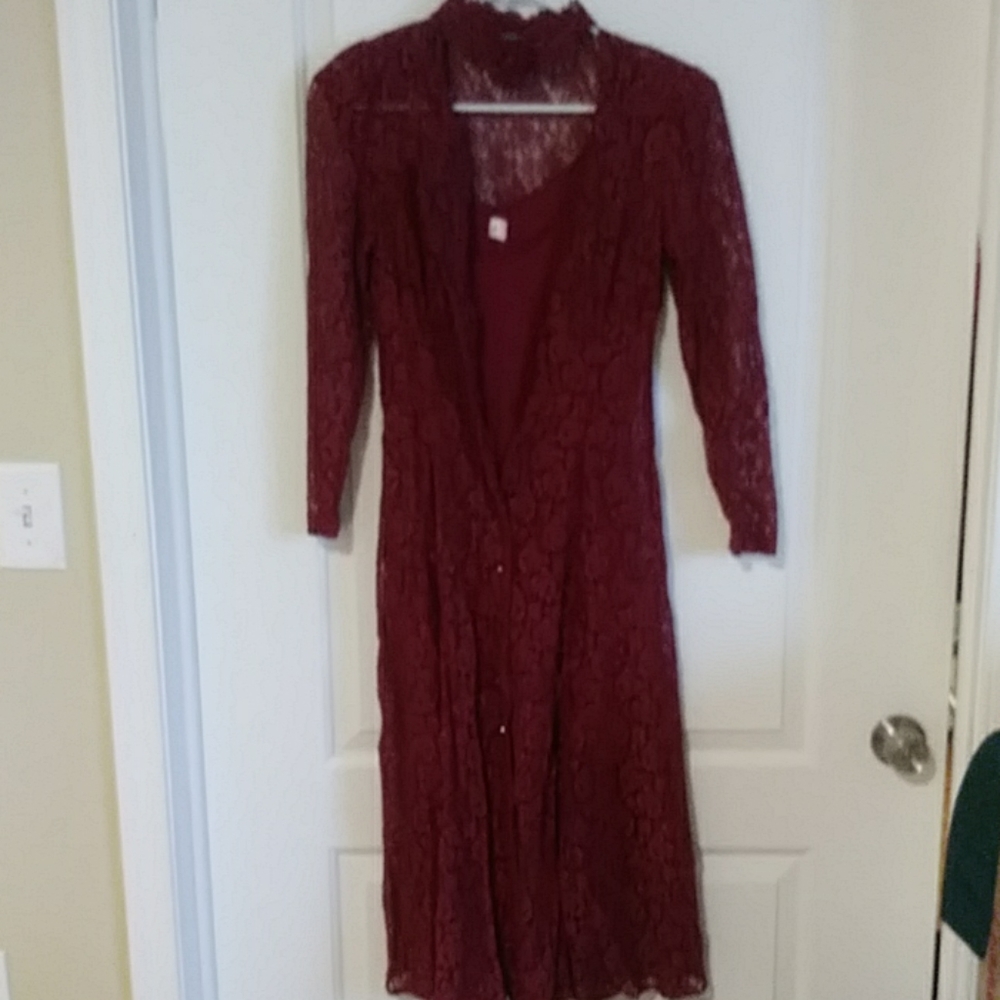 Wine colored sleek gown.